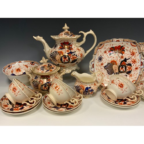 326 - A 19th century English porcelain ‘Imari’ pattern tea service for six comprised of; a tea pot, sugar ... 