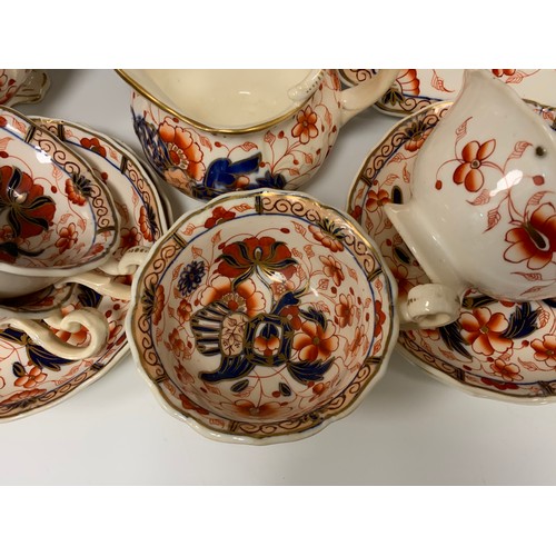 326 - A 19th century English porcelain ‘Imari’ pattern tea service for six comprised of; a tea pot, sugar ... 