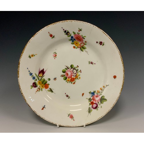 334 - An early 19th century Swansea porcelain plate, in the manner of William Billingsley, decorated with ... 