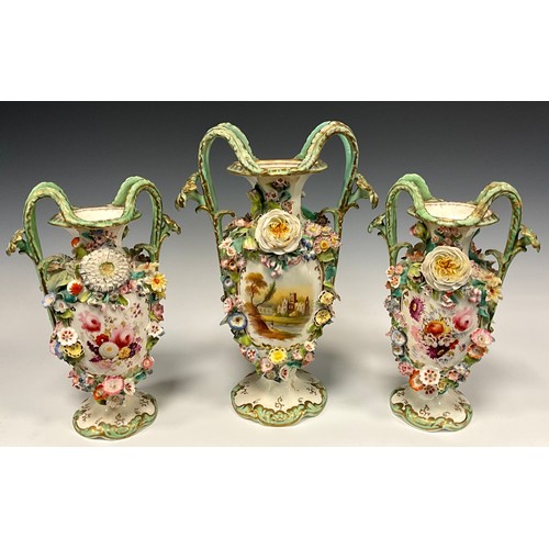 328 - A mid 19th century English porcelain three piece vase garniture, each of twin handled baluster shape... 