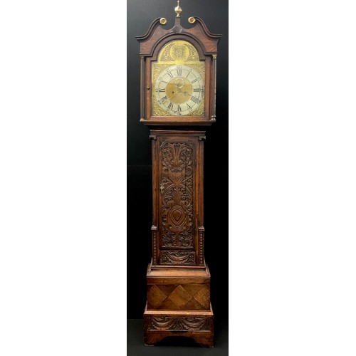 1030A - A 19th century carved oak cased eight day longcase clock, unnamed arched sunburst gilt dial with sil... 