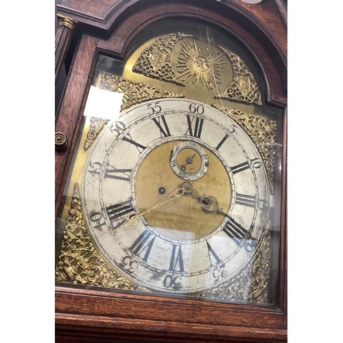 1030A - A 19th century carved oak cased eight day longcase clock, unnamed arched sunburst gilt dial with sil... 