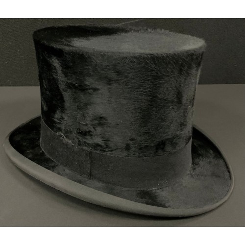 892A - A brushed silk top hat, marked 7.1/4 inches, 20.5cm x 17.3cm, in J W Allen Maker to HRH The Prince o... 