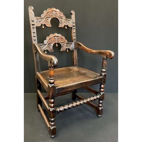 1274 - An 18th century carved oak Yorkshire armchair, 107cm high x 57cm wide x 57cm deep.