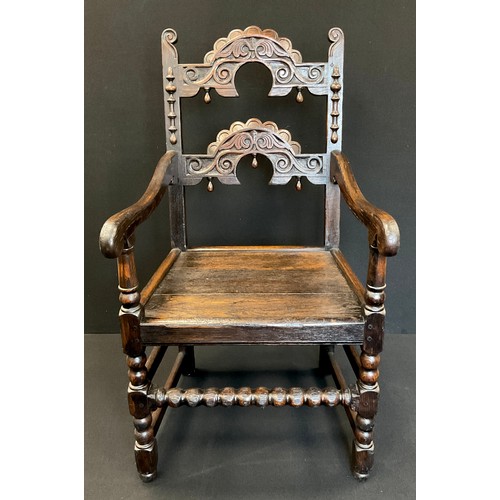 1274 - An 18th century carved oak Yorkshire armchair, 107cm high x 57cm wide x 57cm deep.