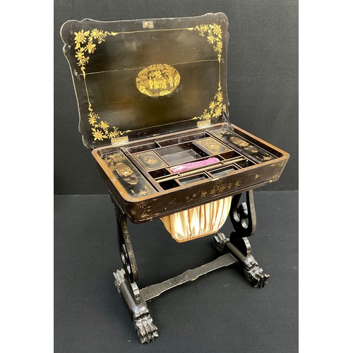 895 - A Victorian Chinoiserie lacquered work-table, the hinged carved top enclosing an arrangement of comp... 