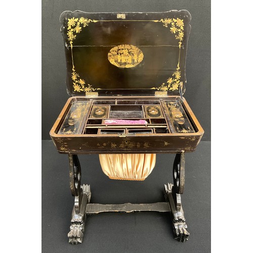 895 - A Victorian Chinoiserie lacquered work-table, the hinged carved top enclosing an arrangement of comp... 