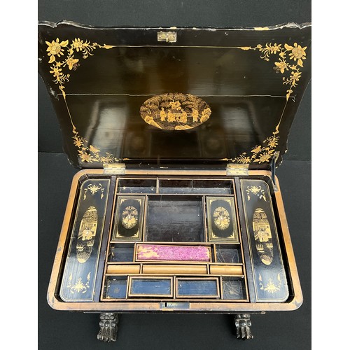 895 - A Victorian Chinoiserie lacquered work-table, the hinged carved top enclosing an arrangement of comp... 