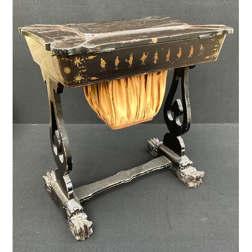 895 - A Victorian Chinoiserie lacquered work-table, the hinged carved top enclosing an arrangement of comp... 