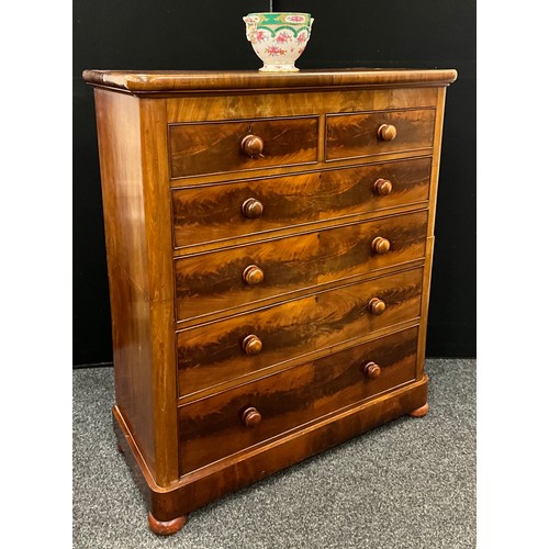 1280 - A Victorian mahogany tall chest of two short above four graduated long drawers with turned mahogany ... 