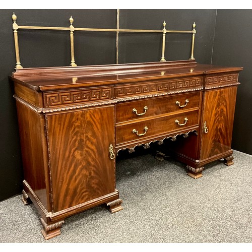 1279 - A George III revival mahogany sideboard, of neoclassical design, having a brass quarter galleried ba... 