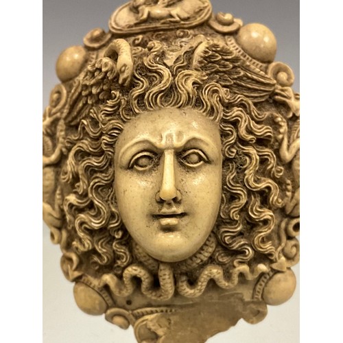 301 - A fine quality 19th century well carved Pompeii lava cameo mask head brooch as Medusa with long flow... 