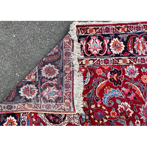 1285 - A Persian Kirman carpet, all over floral garden design inc tones of blue, cream, pink and black, on ... 