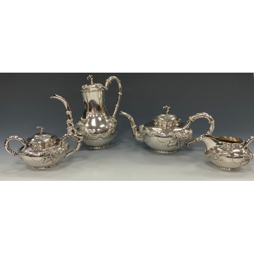 25 - A Chinese silver four piece tea and coffee service, comprising teapot, coffee pot, milk jug and sucr... 