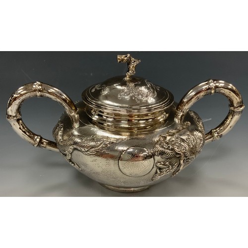 25 - A Chinese silver four piece tea and coffee service, comprising teapot, coffee pot, milk jug and sucr... 