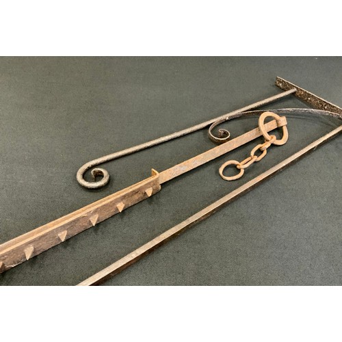 1136 - A 16/17th century style wrought Iron bar slide lock, square bar, looped hoop, approx 2156cm long;  a... 