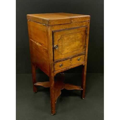 1041 - A George III mahogany bedside wash-stand cabinet, the pair of hinged doors to top lifting to reveal ... 