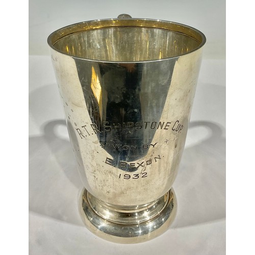 52 - A George V silver pedestal mug, inscribed 'R.T.R. Shipstone Cup, Won By E. Bexon, 1932' 13.5g, Sheff... 