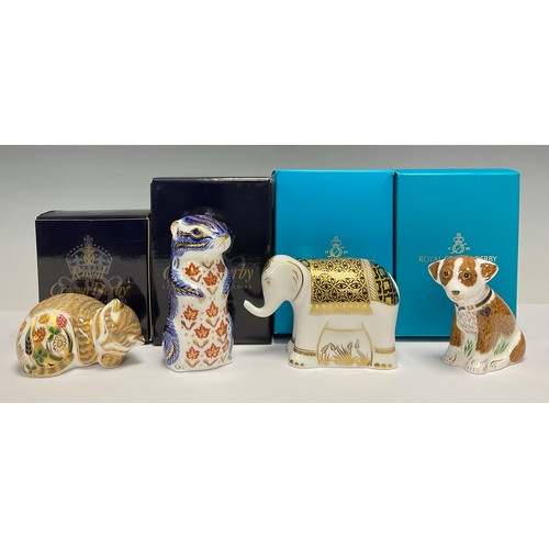 74 - A Royal Crown Derby paperweight, Aura, baby Elephant, gold stopper, boxed; others, Colin Puppy, gold... 