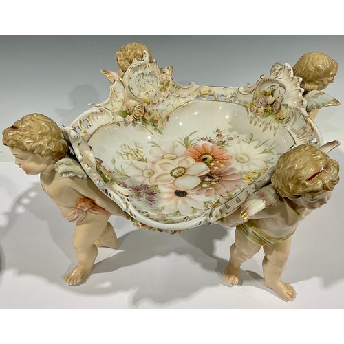 82 - A Sitzendorf porcelain table centre, shaped rectangular dish in the rococo manner, decorated and enc... 