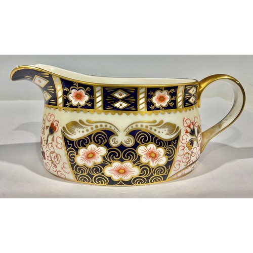 88 - A Royal Crown Derby Imari palette 2451 pattern sauce boat, second quality, printed mark in red