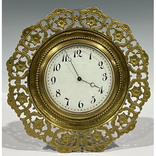 95 - A Victorian brass easel strutt timepiece, Arabic numerals on circular white dial, pierced floral fra... 