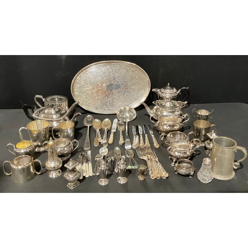 125 - Plated Ware - a silver plated three piece tea service; another; other plated tea ware; an oval galle... 