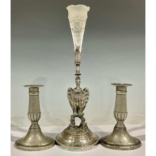 126 - A Victorian silver plated epergne, the column cast as an eagle, matched moulded glass flute, circula... 