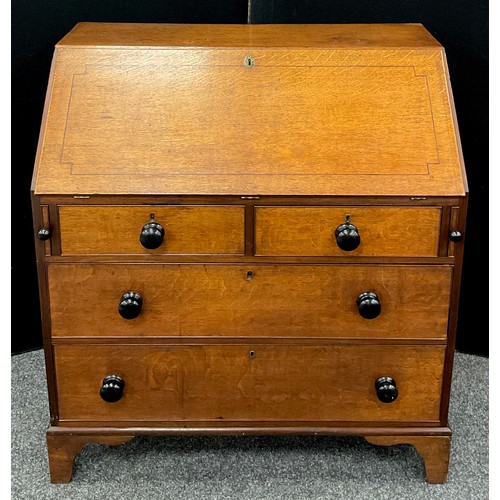 1291 - An early Victorian oak Bureau, 107cm high x 99cm wide x 53cm deep.