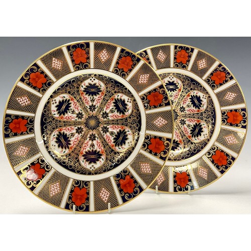 1 - A pair of Royal Crown Derby Imari palette 1128 pattern dinner plates, 27cm diameter, both first qual... 