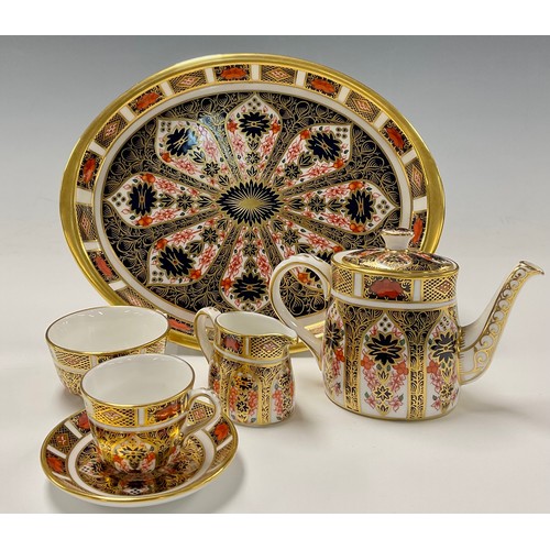 2 - Royal Crown Derby 1128 Imari pattern miniature cabaret tea set comprising teapot, teacup and saucer,... 