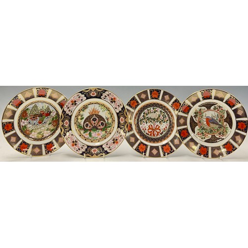 10 - An assortment of eight Royal Crown Derby Christmas plates, 1991 - 1998, comprising The Royal Crown D... 