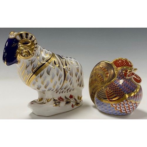 13 - A Royal Crown Derby paperweight, Cockerel, gold stopper, 11cm high; Ram, gold stopper, 14cm high (2)