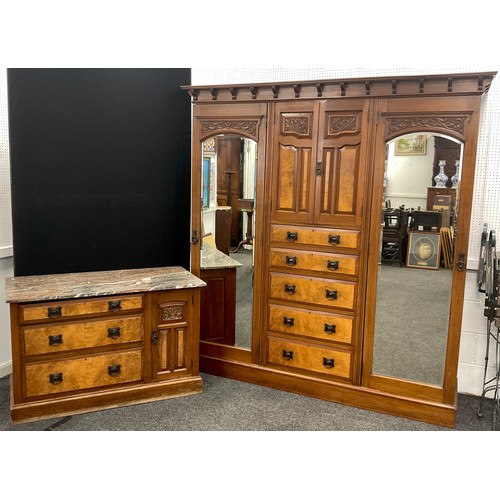 1297 - A Victorian walnut compactum wardrobe, and a matching washstand chest with three graduated long draw... 