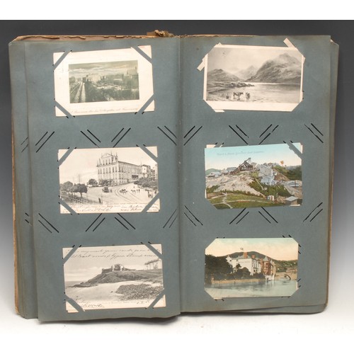 4059 - Postcards – an Edwardian postcard album, tall 4to embossed colour printed boards, (stained, spine re... 