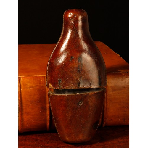 3593 - A 19th century leather travelling flask, push-fitting cover enclosing a clear glass bottle, 17.5cm l... 