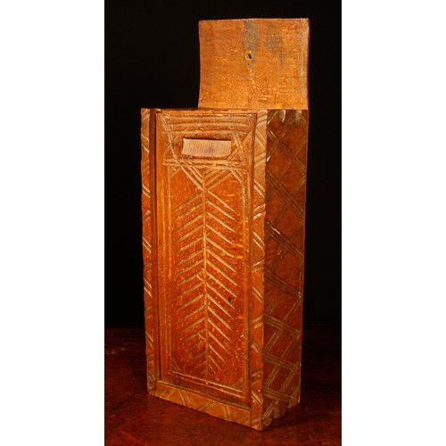 3500 - Treen - a 19th century vernacular beech candle box, chip carved with diapers and a stylised leaf or ... 