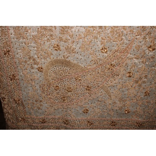 3691 - An Indian wedding shawl, worked in gilt thread, 246cm x 106cm