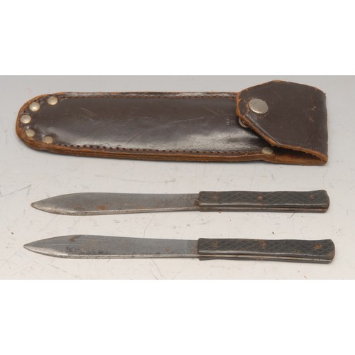 3745 - A bowie type utility or hunting knife, 12.5cm saw-back blade, two-piece grip, 22cm long overall, lea... 