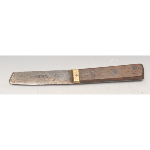 3745 - A bowie type utility or hunting knife, 12.5cm saw-back blade, two-piece grip, 22cm long overall, lea... 