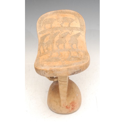 3777 - Tribal Art - a Turkana headrest, 18cm wide, Kenya; another, carved with animals; others (5)