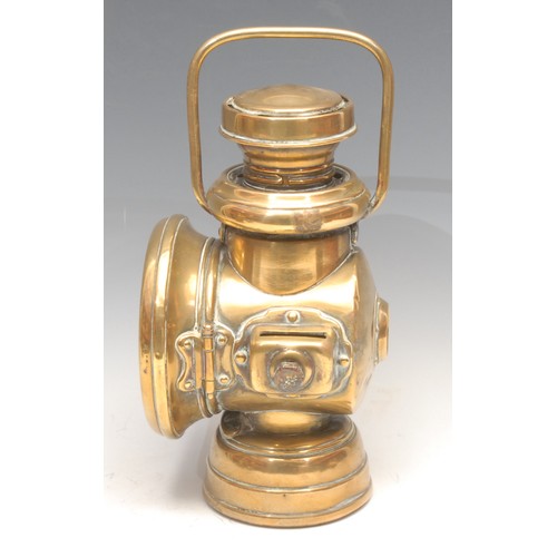 3354 - Automobilia - an early 20th century brass carriage lamp, Lucas No 724, King of the Road; another, Po... 