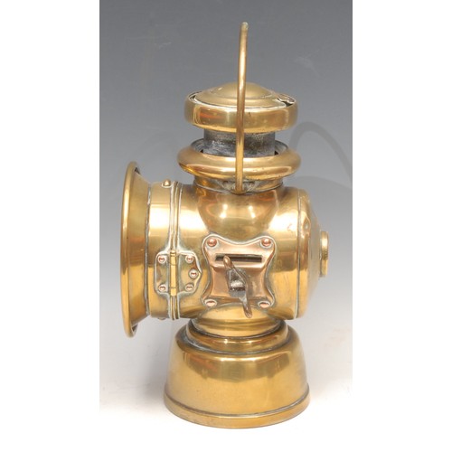 3354 - Automobilia - an early 20th century brass carriage lamp, Lucas No 724, King of the Road; another, Po... 