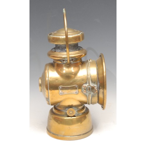 3354 - Automobilia - an early 20th century brass carriage lamp, Lucas No 724, King of the Road; another, Po... 