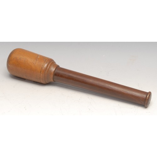 3498 - Treen - a 19th century turned lignum vitae pestle, 29.5cm long