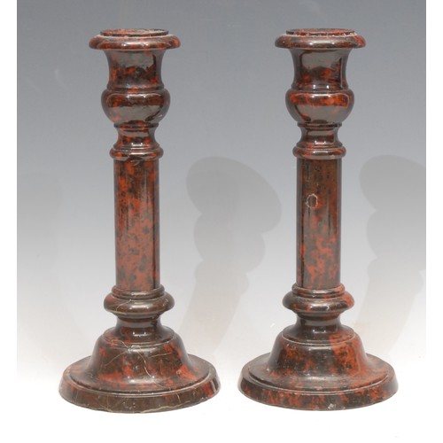 3133 - A pair of 19th century Cornish serpentine candlesticks, campana sconces, domed circular bases, 25cm ... 