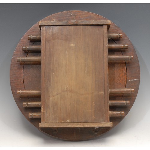 3302 - An early 20th century oak circular wall mounted perpetual calendar, glazed apertures for day, date a... 