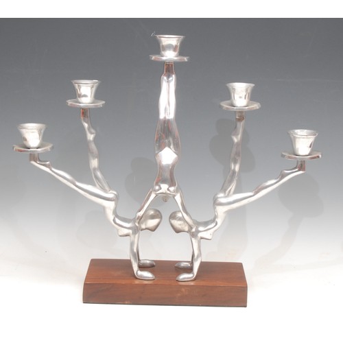 3460 - Modern Design - a sculptural alloy five-light candelabrum, cast as three nude acrobats, rectangular ... 