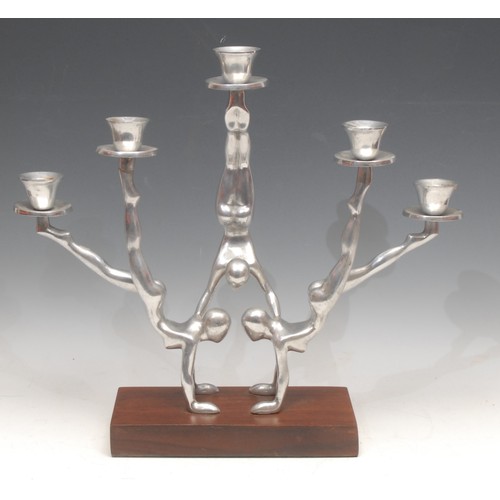 3460 - Modern Design - a sculptural alloy five-light candelabrum, cast as three nude acrobats, rectangular ... 