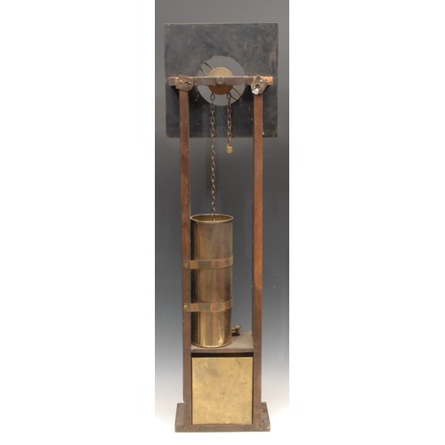 3652 - An apocryphal water clock, 21cm square brass dial, the cistern engraved with sunburst, 79cm high